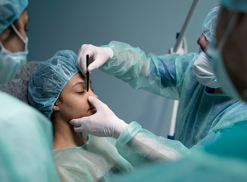 side-view-doctor-checking-patient-before-rhinoplasty